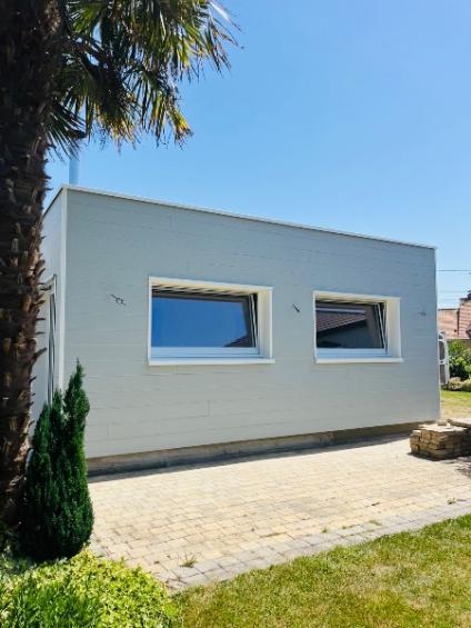 CONSTRUCTION D'UNE EXTENSION EN OSSATURE BOIS A GROFFLIERS... 
