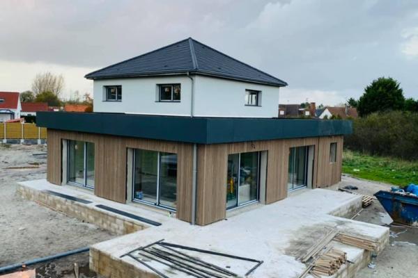 HABILLAGE EN BARDAGE D'UNE MAISON EN CONSTRUCTION A GROFFLIERS